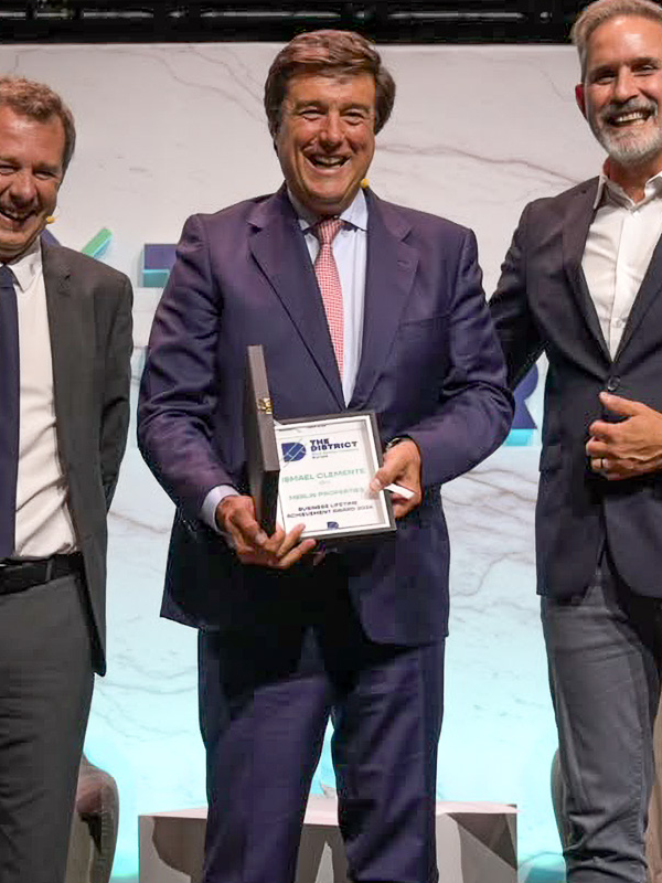 Ismael Clemente at the 2026 The District event receiving recognition for his career in the real estate sector.
